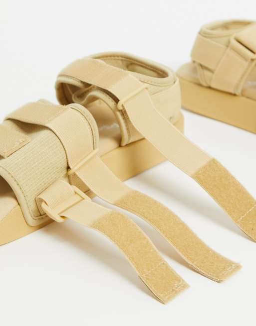 Adidas Originals Adilette Sandals In Beige Asos
