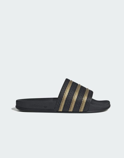 adidas Originals – Adilette – Slider in Schwarz und Gold - view 1