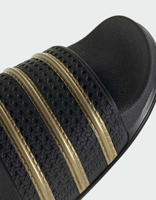 adidas Originals – Adilette – Slider in Schwarz und Gold, 5 von 5