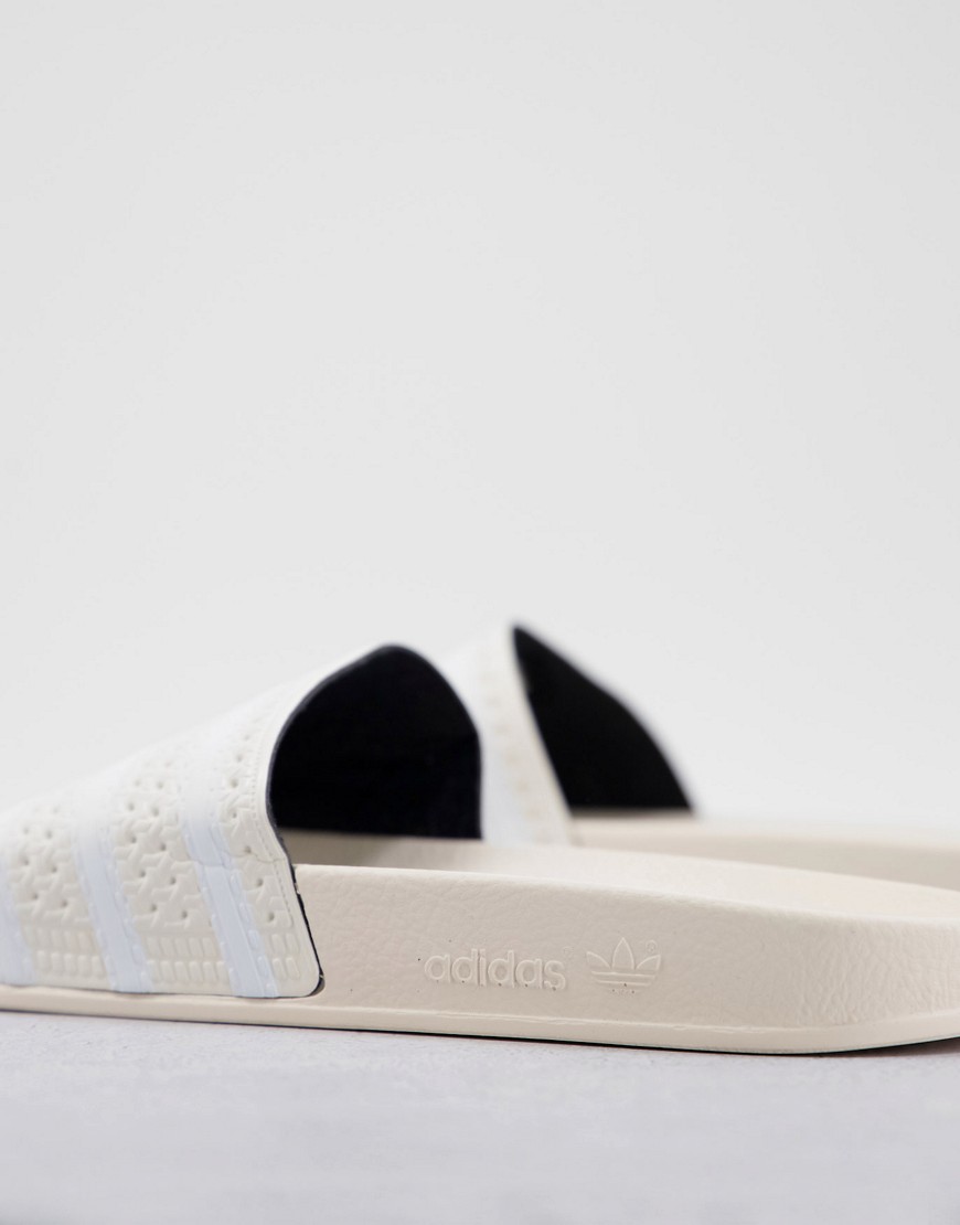 adilette - Sliders in bianco wonder - adidas Originals infradito uomo Bianco - immagine1
