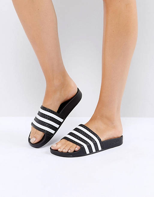 Women Flip Flops/adidas Originals Adilette sliders in black and white 