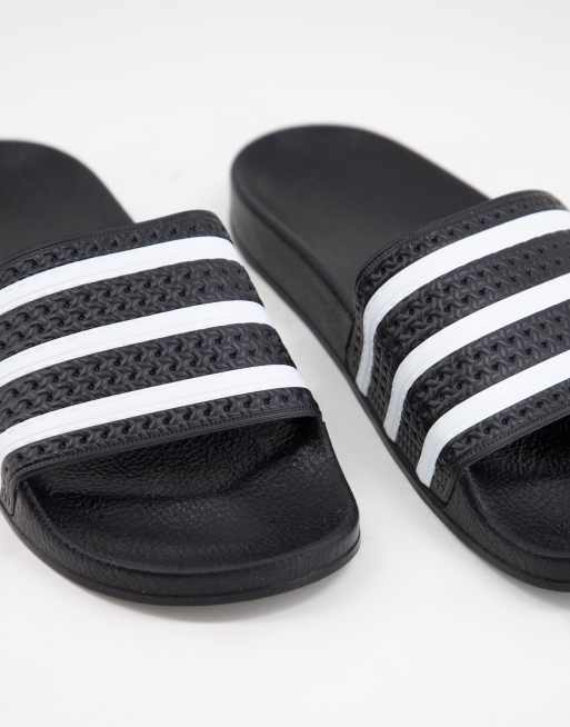 adidas Originals adilette sliders in black and white ASOS