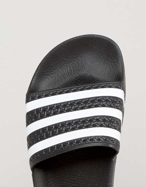 Adidas originals adilette hot sale sliders in black