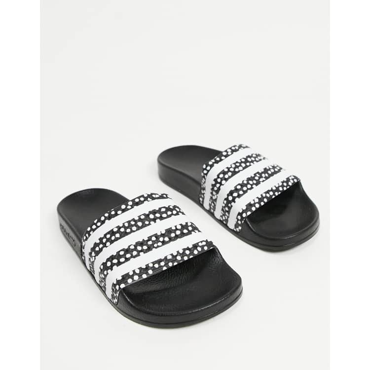 adidas Originals Adilette sliders in black with polka dot print ASOS