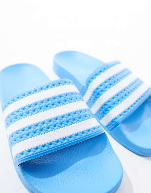 adidas Originals Adilette sliders in bright blue ASOS