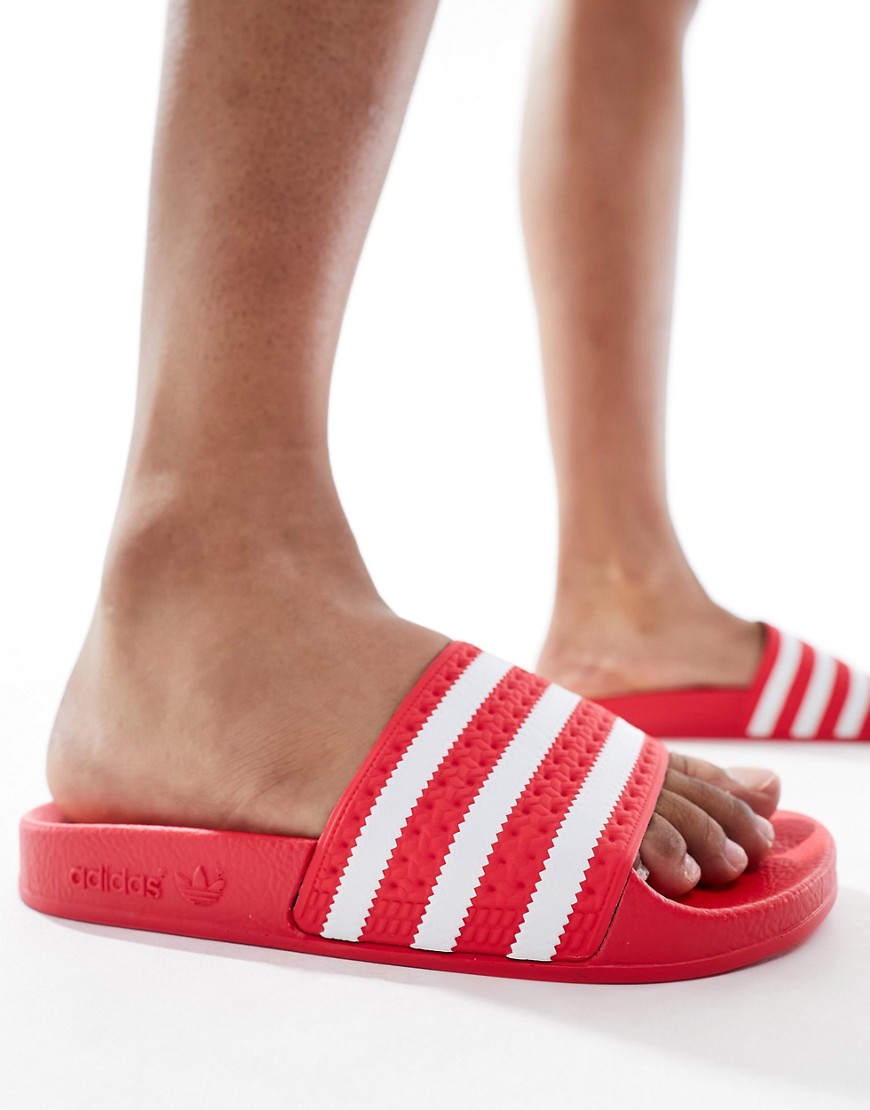 adidas Originals Adilette sliders in coral red-Pink