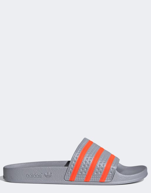 Morgenøvelser Bliv klar Held og lykke adidas Originals adilette sliders in gray and orange | ASOS