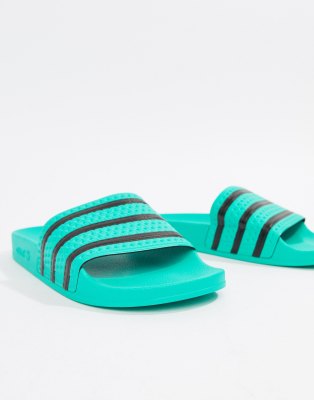 turquoise adidas slides