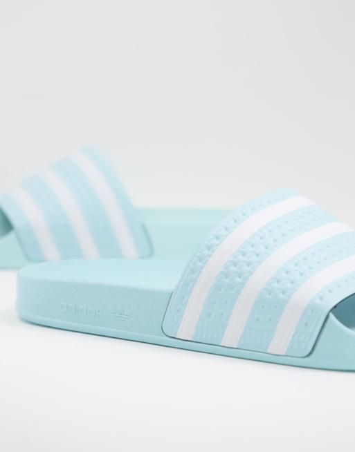 Adilette store light blue