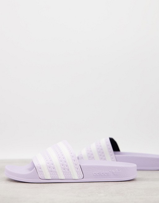 adidas Originals Adilette sliders in lilac