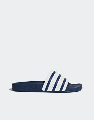  adilette sliders  and white