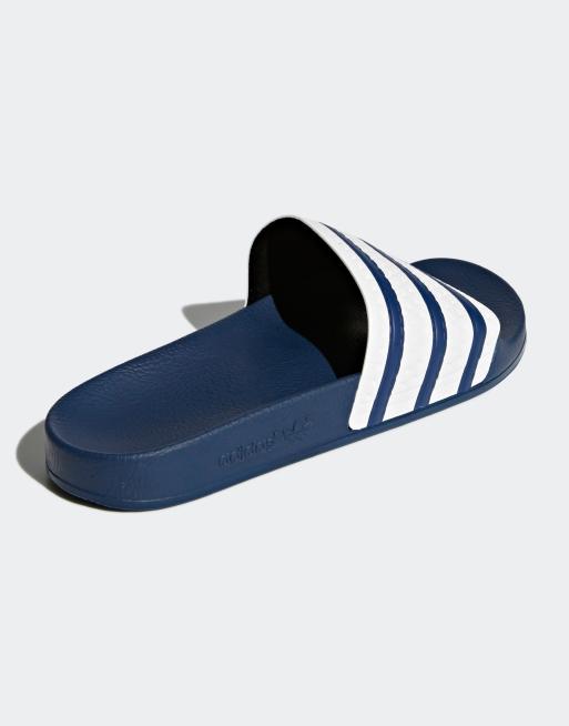 adidas Originals Adilette sliders in navy and white ASOS