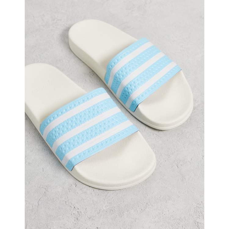 Blue and 2024 white adidas slides