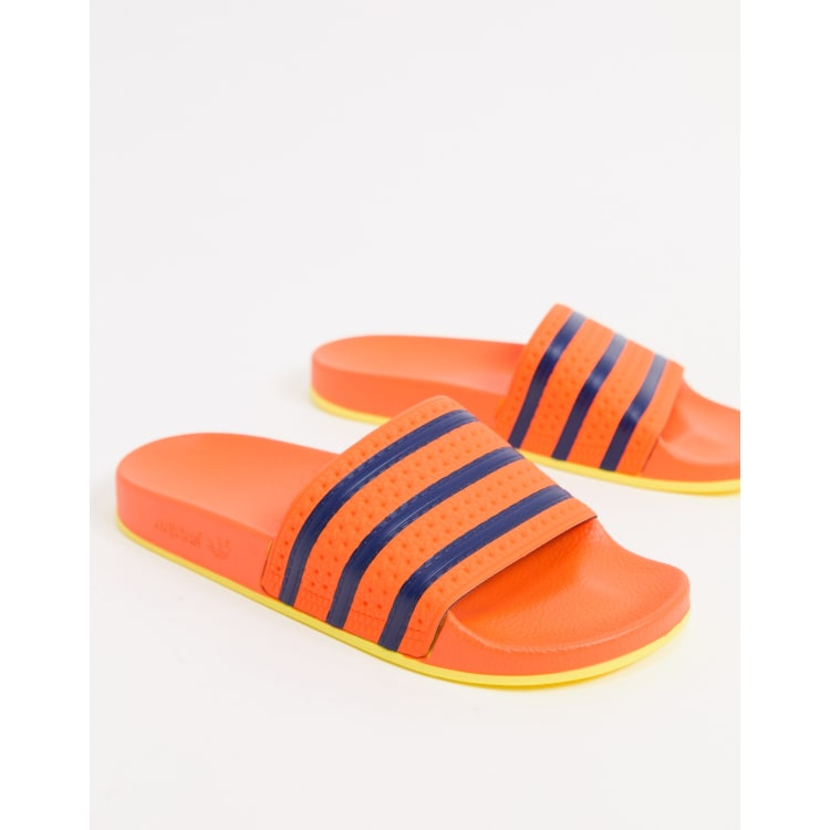 Orange store adidas sliders