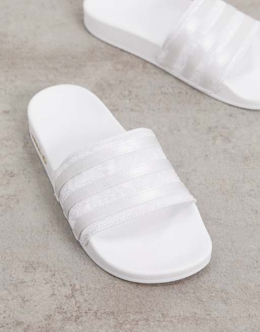 adidas Originals adilette sliders in silver ASOS