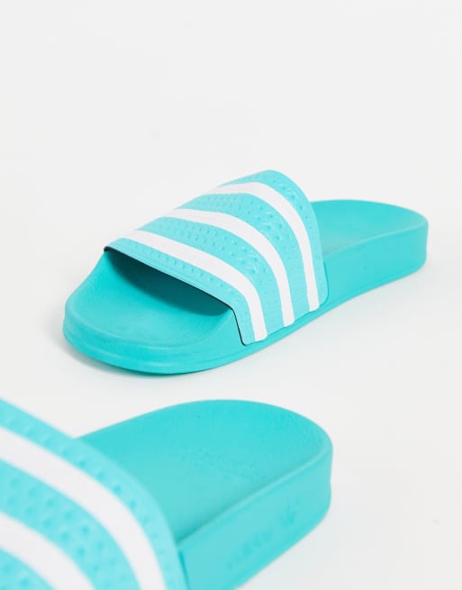 Turquoise best sale adidas slides