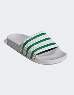 green and white adidas sliders