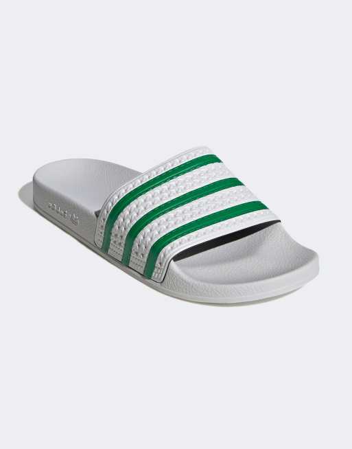 adidas Originals adilette sliders in white and green