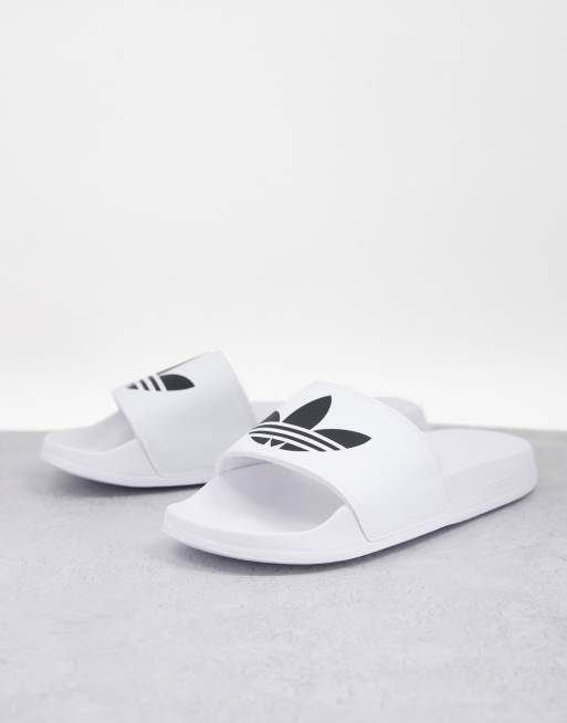 Adidas adilette 2024 white slides