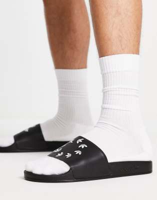 adidas Originals repeat logo Adilette sliders in black - ASOS Price Checker