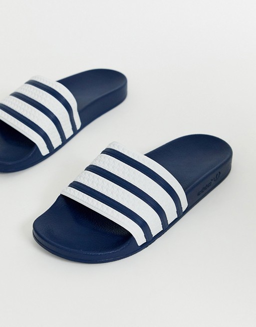 adidas Originals Adilette sliders with navy stripes