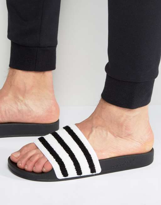 Uskyld diktator Anvendelig adidas Originals Adilette Slides In Black Toweling BB0125 | ASOS