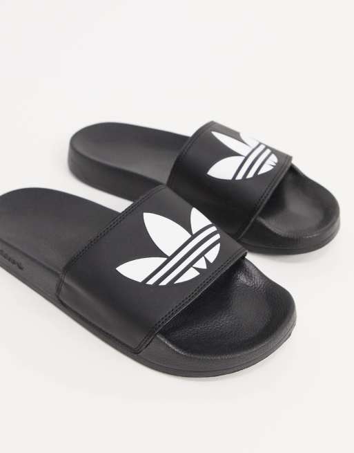 adidas Originals adilette slides in black ASOS adidas Originals adilette slides in black ASOS
