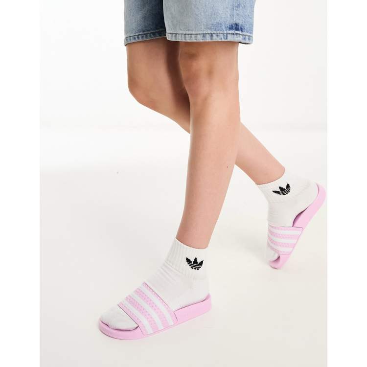 Pink and white adidas slides online