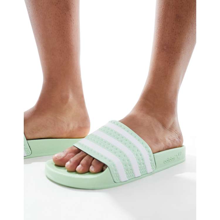 Adidas teen slippers deals