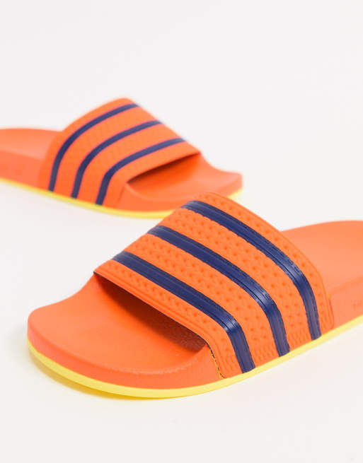 erotisch vertel het me werkplaats adidas Originals - Adilette - Slippers in oranje | ASOS