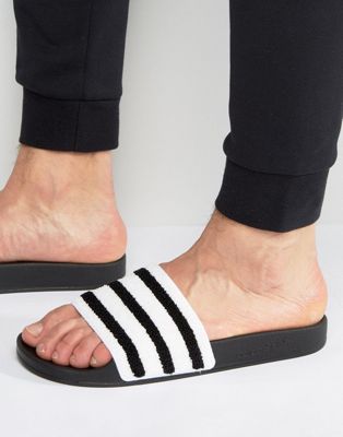 adidas Originals - Adilette - Slippers in zwart BB0125