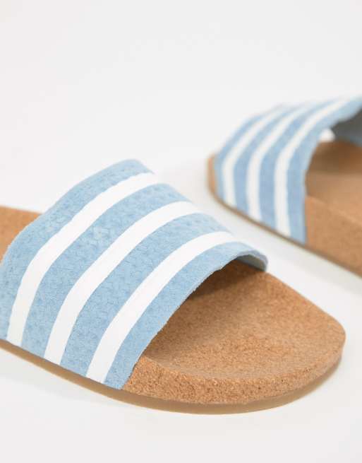 Betrouwbaar symbool Auroch adidas Originals - Adilette - Slippers van kurk in blauw | ASOS