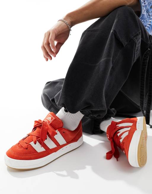 adidas Originals Adimatic gum sole sneakers in red and white