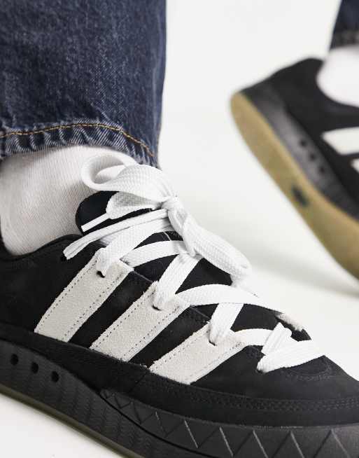 adidas Originals Adimatic gum sole trainers in black and white