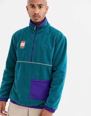 purple and green adidas jacket