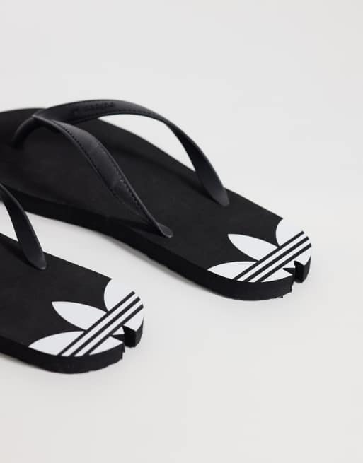 adidas Originals – adisun – Zehenstegsandalen in Schwarz , 4 von 4