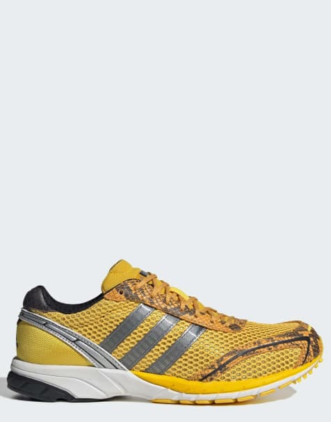 adidas Originals Adizero adios OG trainers in yellow and silver - view 1