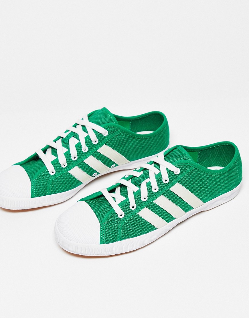 adidas Originals Adria trainers in green and white