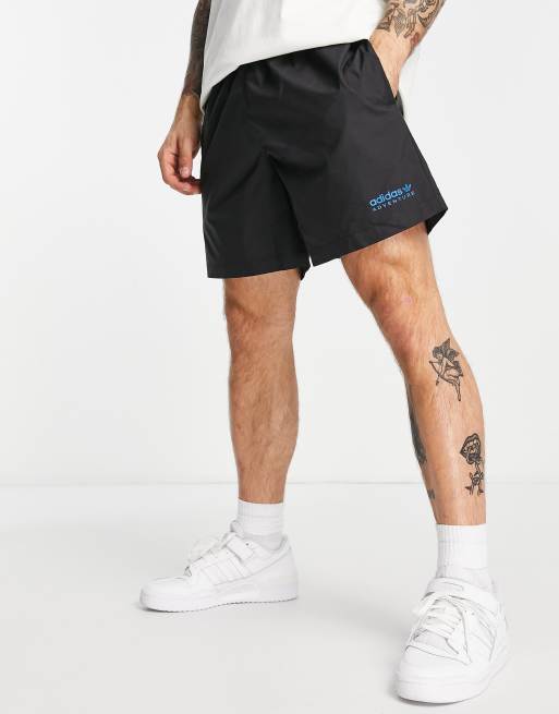 adidas adventure graphic shortsadidas Originals Adventure 6 inch shorts in  black 