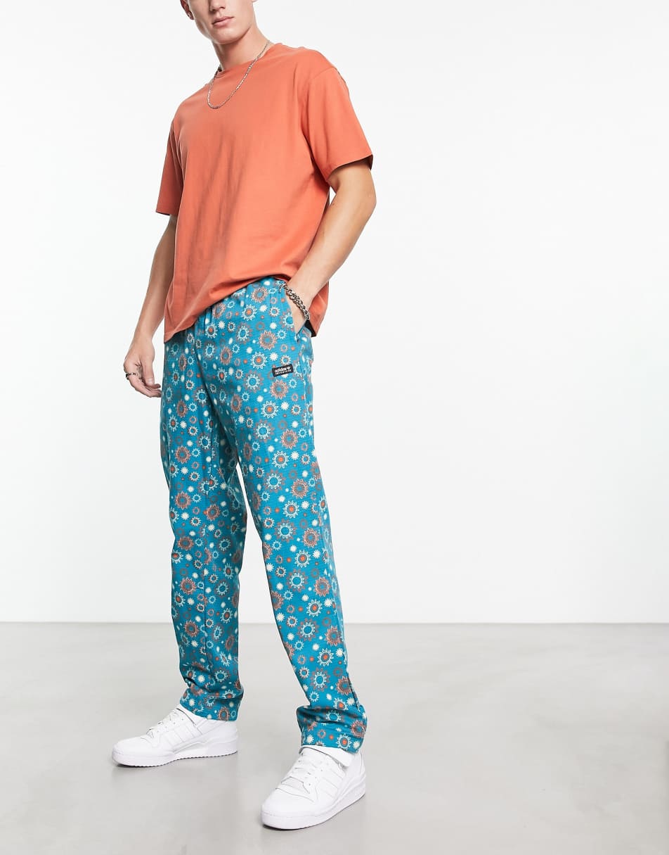 adidas Originals Adventure all over print cargo trousers in blue
