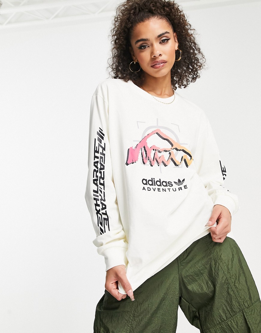 Adidas Originals Adventure boyfriend fit long sleeve top in off-white with front graphics