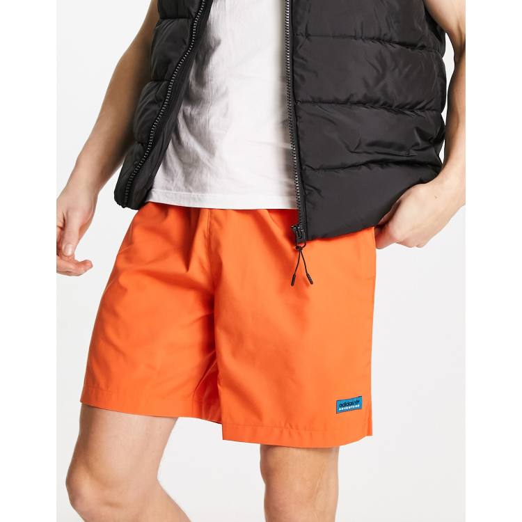 adidas Originals Adventure Geweven short met logo in oranje ASOS