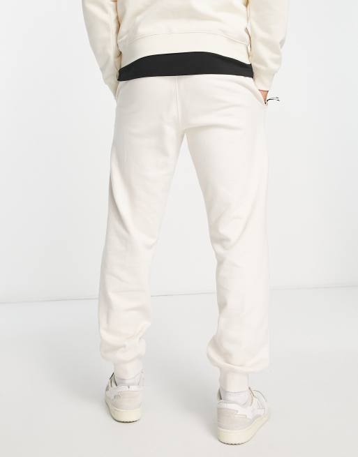 Adidas chino joggers outlet blanco