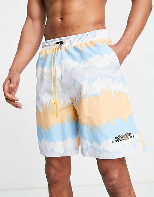 adidas Originals Adventure woven shorts in white with wave print