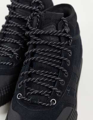 black mid top trainers