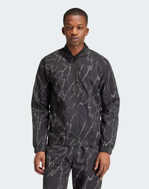 nike sportswear all over print track top