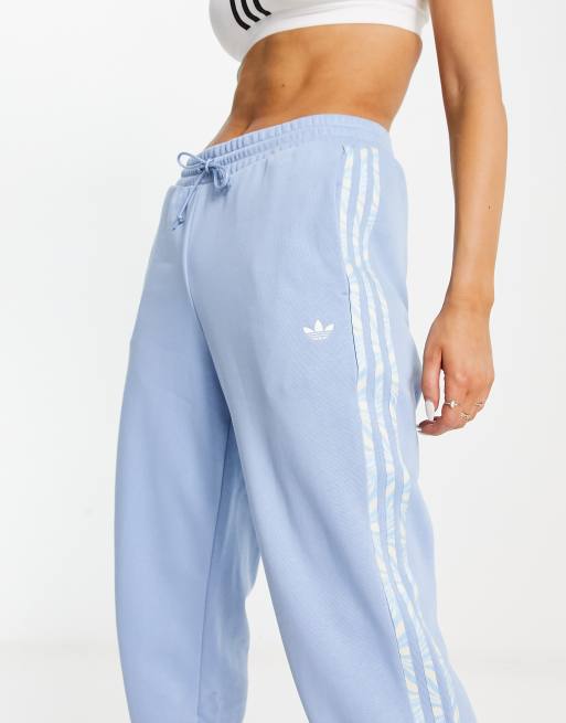 Adidas pants blue hot sale white stripe