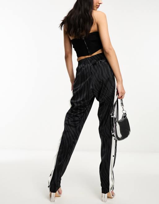 https://images.asos-media.com/products/adidas-originals-animal-adibreak-pants-in-black/204439019-4?$n_640w$&wid=513&fit=constrain