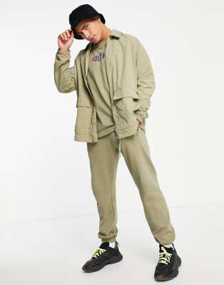 adidas Originals 'Area 33' coach jacket in khaki - ASOS Price Checker