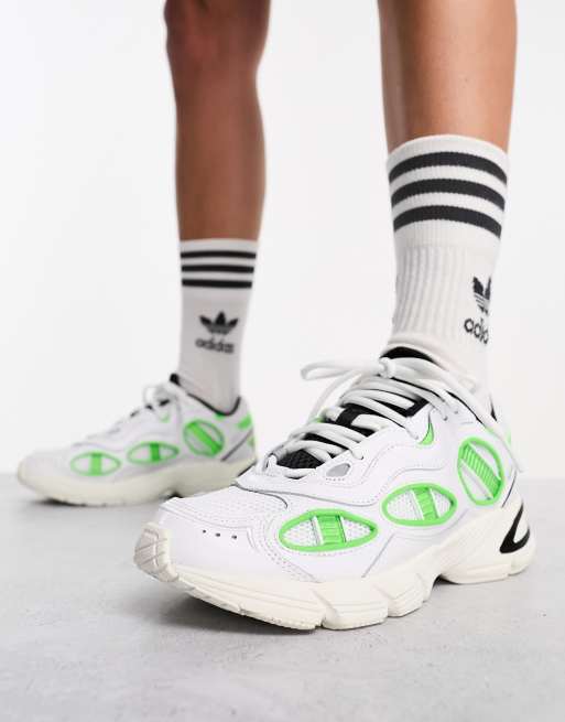 adidas Originals Astir sneakers in white and green